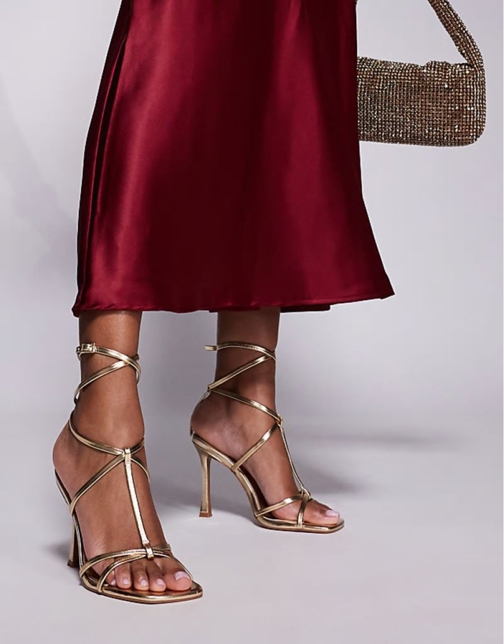 Wide Fit Nobel caged high heeled sandals in gold