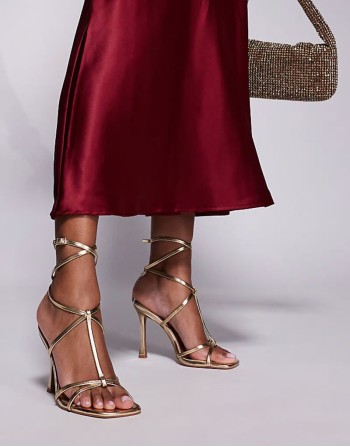 Wide Fit Nobel caged high heeled sandals in gold