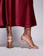Wide Fit Nobel caged high heeled sandals in gold