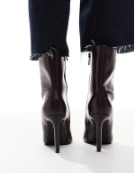 pointed toe heeled boot in deep burgundy