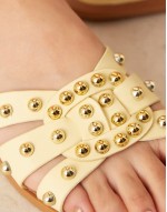 studded flat sandals in butter yellow