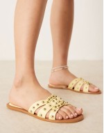 studded flat sandals in butter yellow