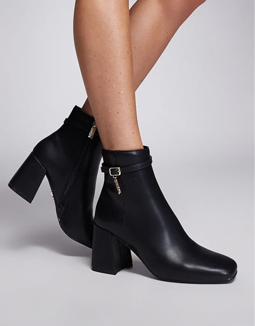 Rissa-E Heeled Ankle boot in Black Leather