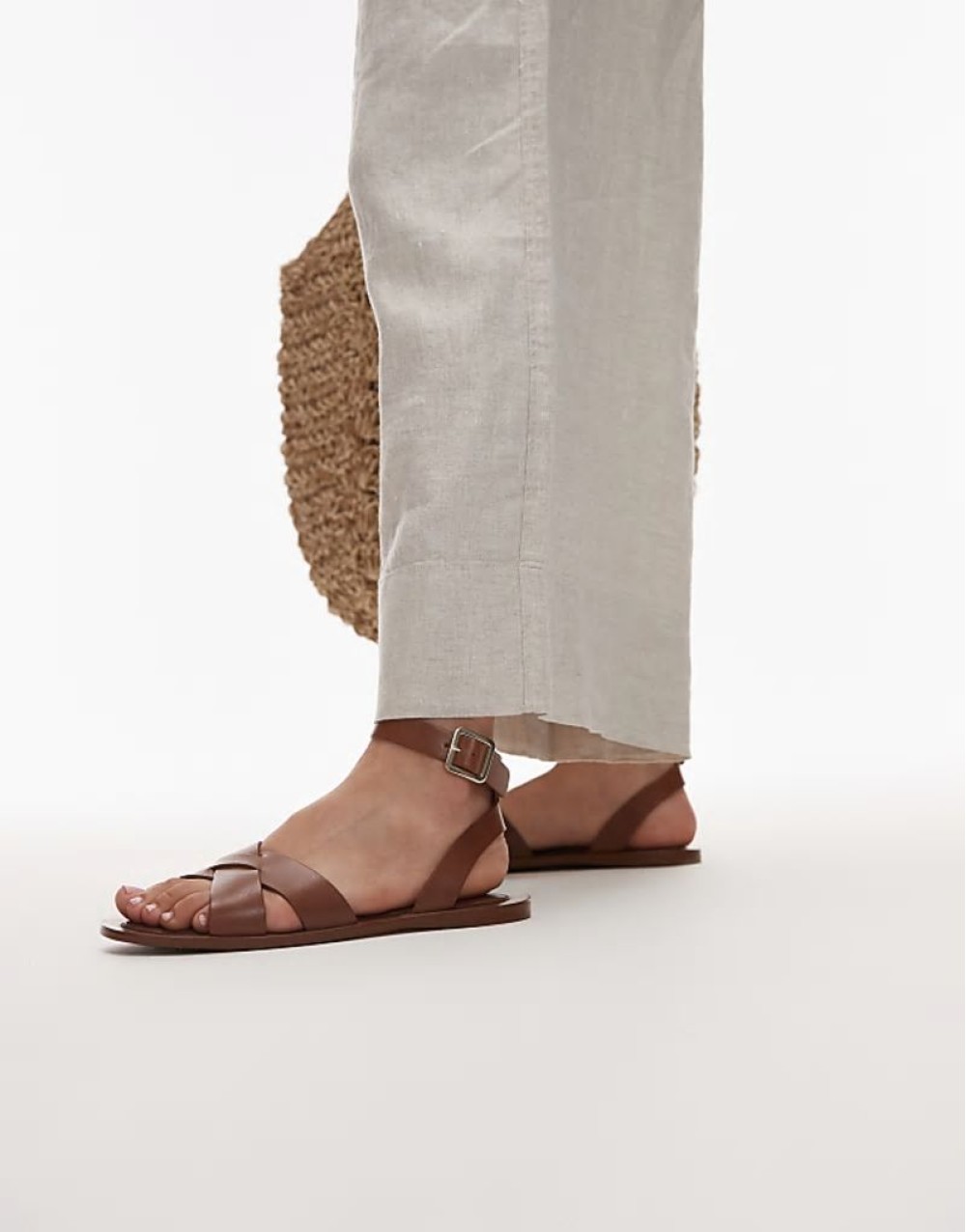 leather flat sandals in brown