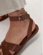 leather flat sandals in brown